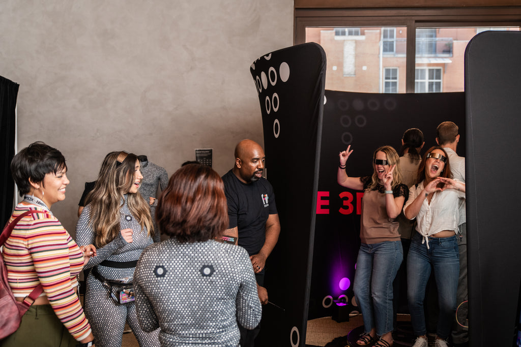 People Enjoy the ZOZOFIT photo booth at SXSW 2023