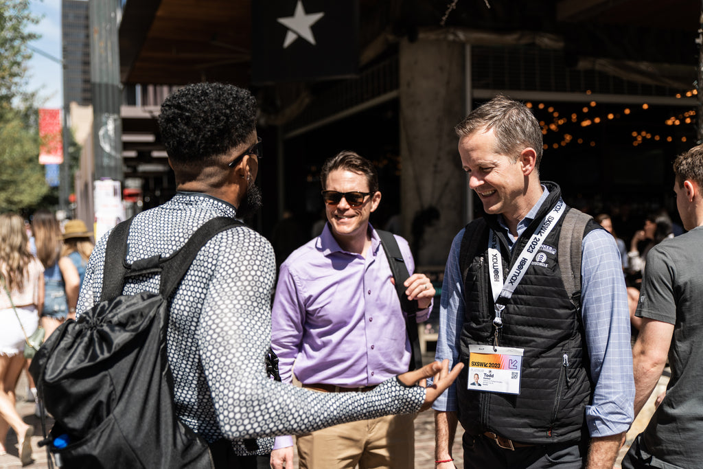 A ZOZOFIT Street Team Member Talks With SXSW attendees