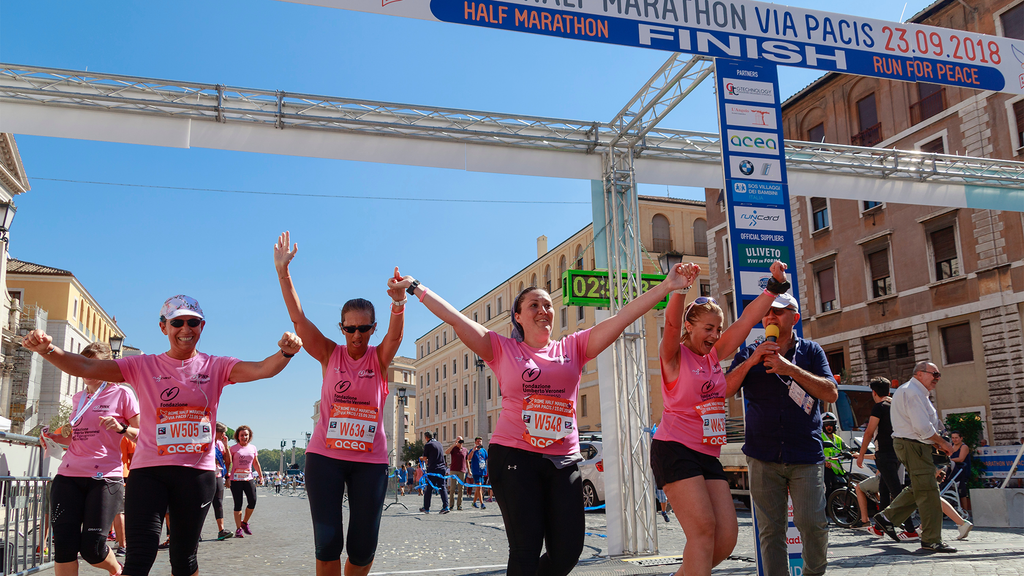 Participants crossing the finish line at a marathon